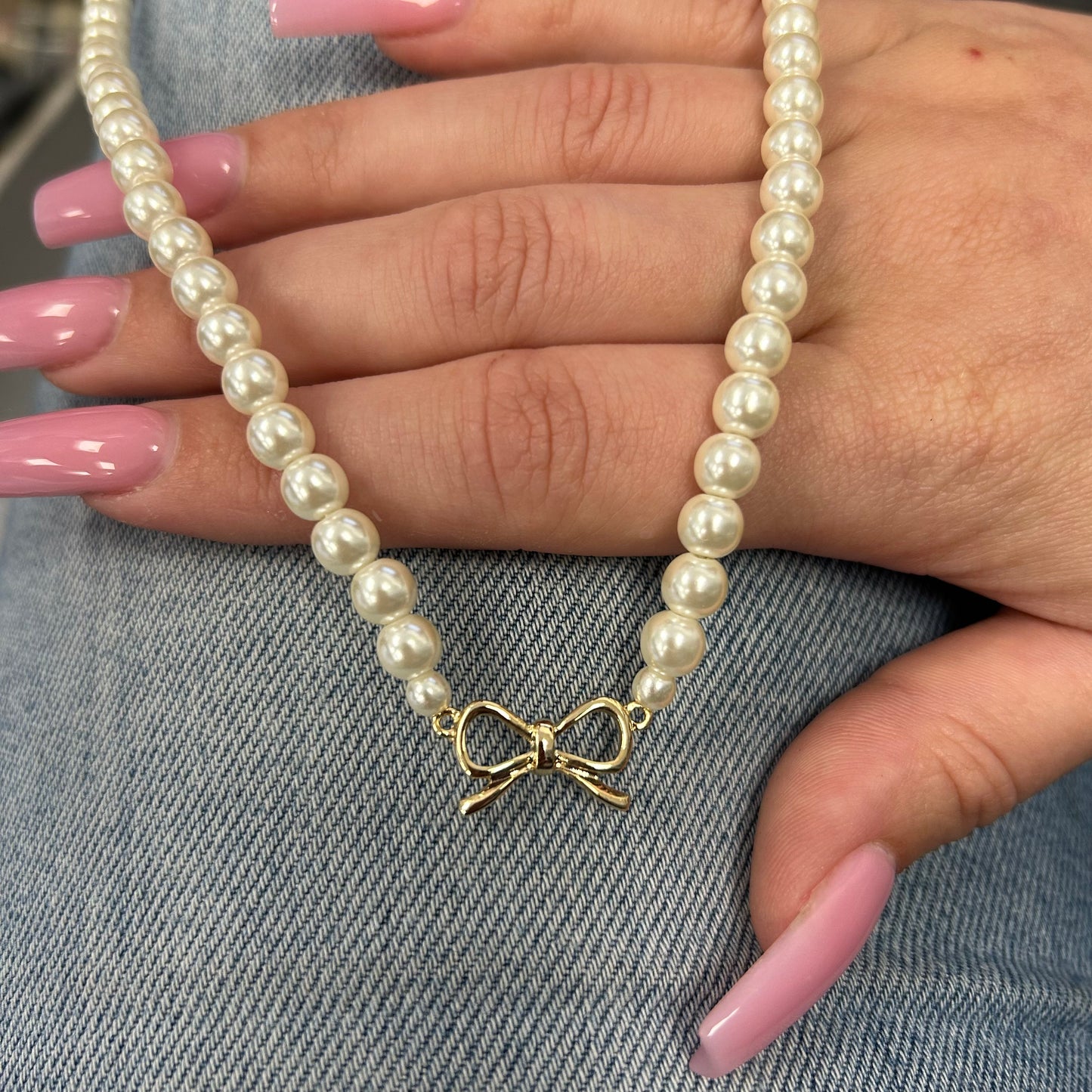 Full Pearl Necklace With Gold Bow Center Charm