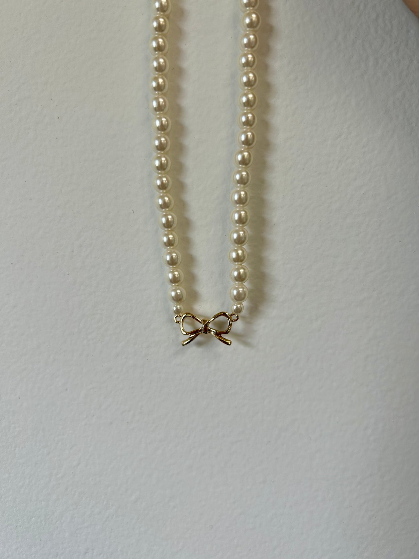 Full Pearl Necklace With Gold Bow Center Charm